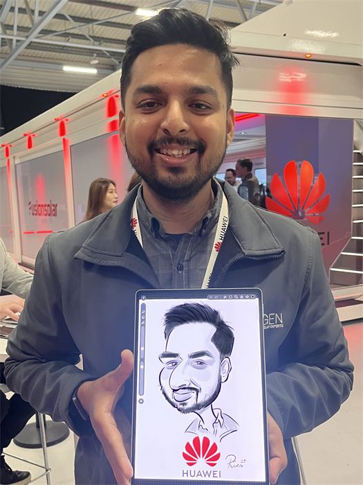 Guest holding his live iPad caricature at a corporate event